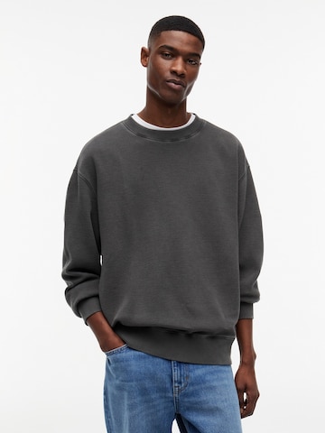 Tommy Jeans Collegepaita värissä musta: etupuoli