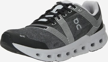 On Running shoe 'Cloudgo' in Black: front