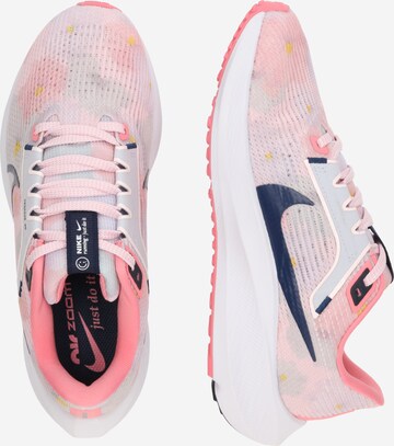 Chaussure de course NIKE en rose