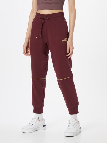 PUMA Tapered Workout Pants in Purple: front