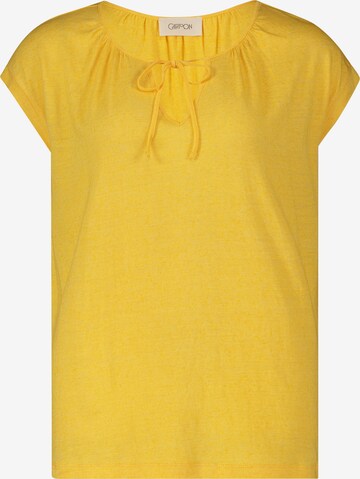 Cartoon - Camiseta en amarillo: frente