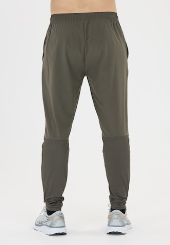 ENDURANCE Tapered Sports trousers 'Jeen' in Green