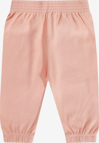 JACKY Tapered Pants in Orange: front