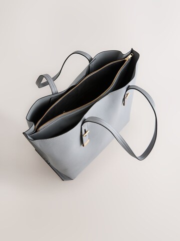 Next Shopper in Grau
