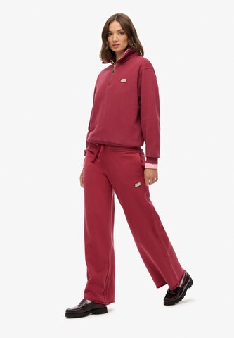 Bootcut Pantalon Superdry en rouge