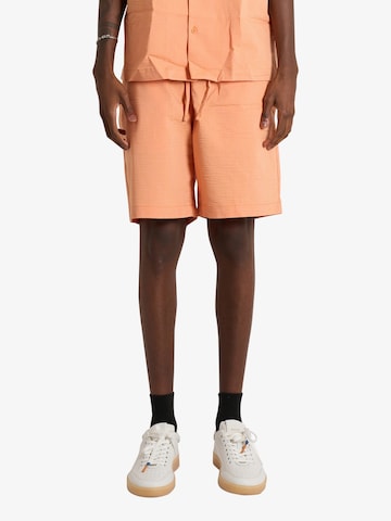 LACOSTE Regular Pants in Orange: front
