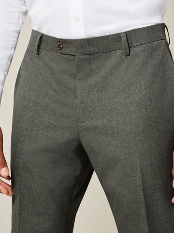 Coupe slim Pantalon chino 'Motion Flex' Next en vert