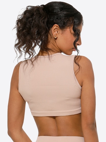 Haut de sport Yenita en beige