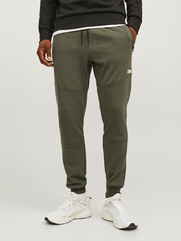 JACK & JONES Tapered Trousers in Green: front