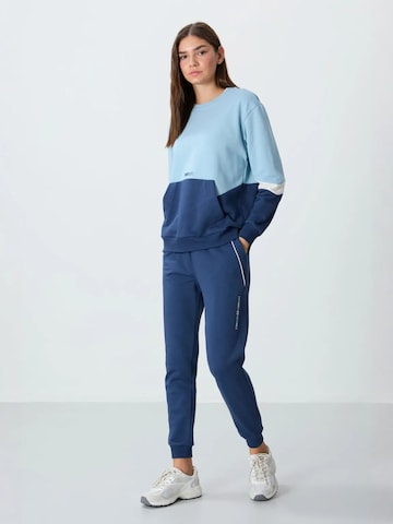 Tommy Life Sports trousers 'Jogginghose' in Blue: front