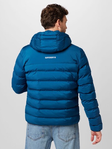 Superdry Zimní bunda – modrá