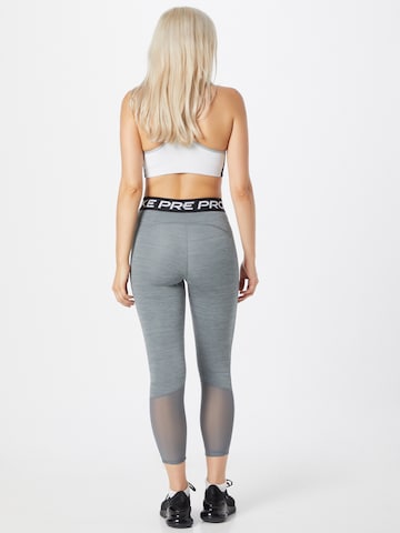 NIKE Skinny Sporthose in Grau