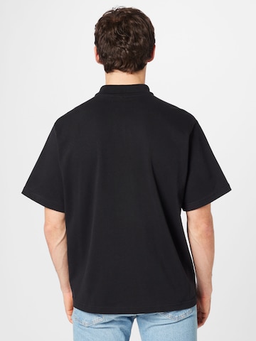 Nike Sportswear Poloshirt in Schwarz