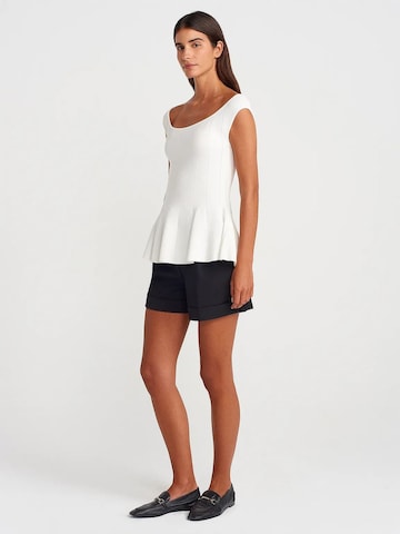 Top in maglia di Dilvin in bianco