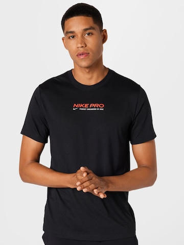 NIKE - Camiseta funcional en negro: frente