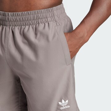 ADIDAS ORIGINALS Sportbadehose 'Essentials Solid' in Braun