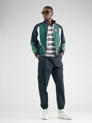 Nike Sportswear Tussenjas 'AIR' in Zwart