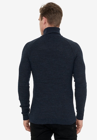 Rusty Neal Pullover mit stilvollem Rollkragen in Blau