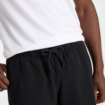 new balance - Loosefit Pantalón 'Athletics French Terry Short 5"' en negro