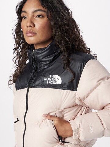 THE NORTH FACE Prehodna jakna 'NUPTSE' | roza barva