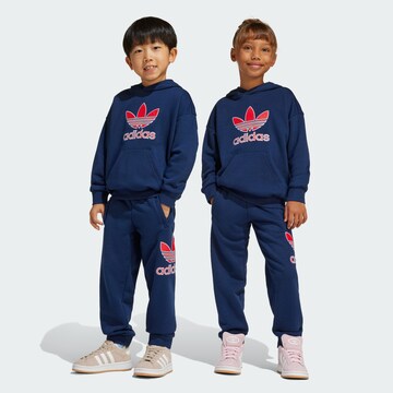 ADIDAS ORIGINALS Joggingová souprava – modrá: přední strana