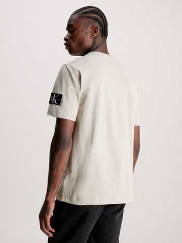 Maglietta di Calvin Klein Jeans in beige