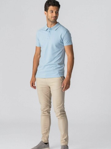 Coupe regular Chemise ' Muscle Polo ' TEESHOPPEN en bleu