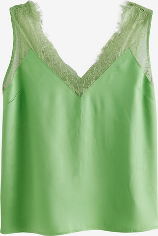 Haut Next en vert : devant