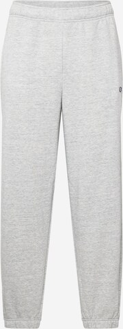 Effilé Pantalon Champion Authentic Athletic Apparel en gris : devant