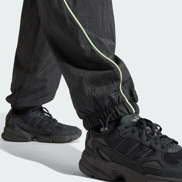 ADIDAS ORIGINALS Loose fit Trousers 'Loose Parachute' in Black