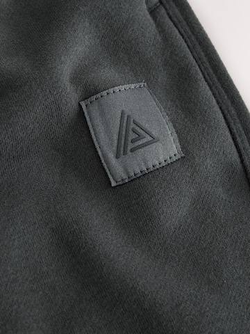 Next - Pierna ancha Pantalón deportivo 'Active' en gris