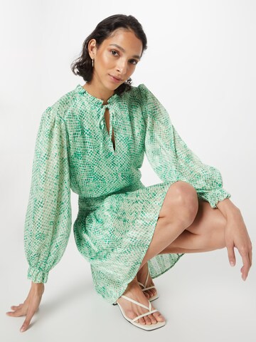 Robe co'couture en vert