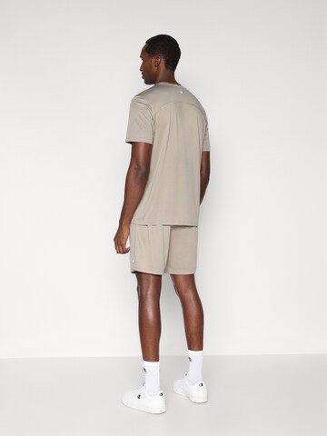 Champion Authentic Athletic Apparel Normální Funkční kalhoty – šedá