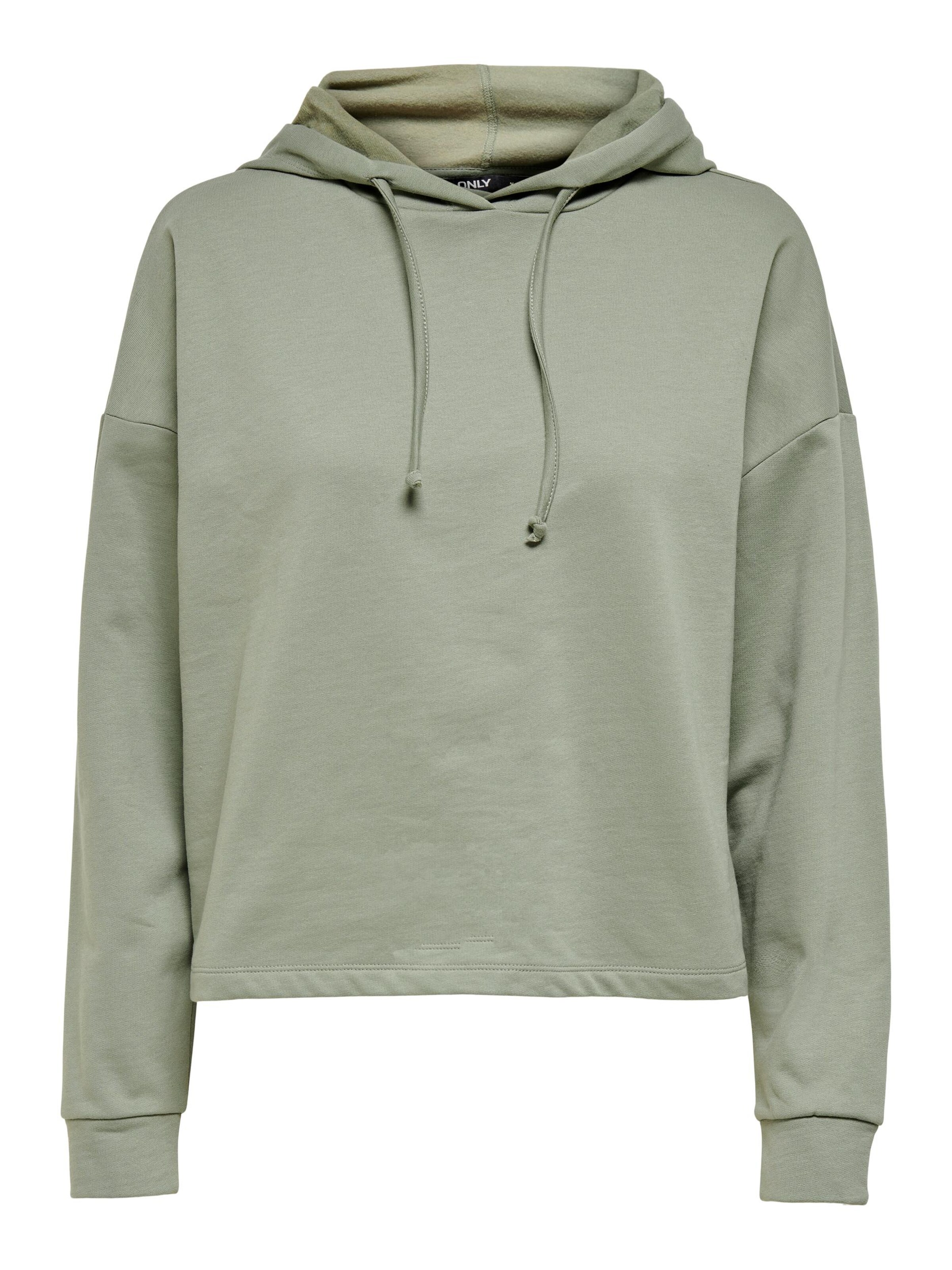 white sweatshirt with green writing