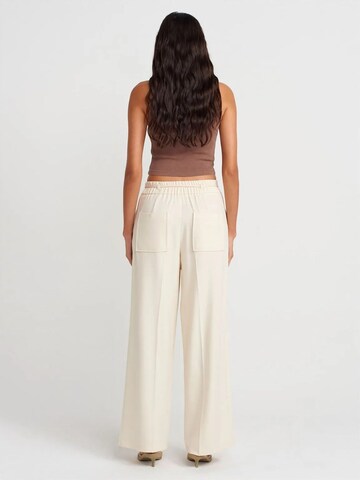 Dilvin Wide leg Pants in Beige