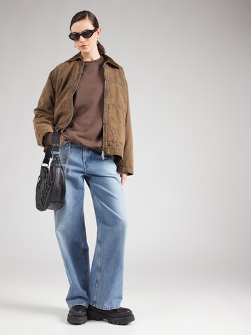 Sweat-shirt 'Viva' WEEKDAY en marron
