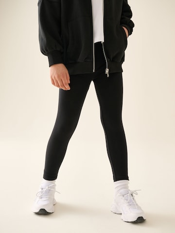 Next - Conjunto en negro