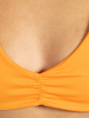 Smilodox Sports top ' Esta ' in Orange