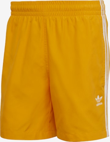 ADIDAS ORIGINALS Swimming Trunks in Yellow: front