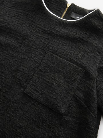 Robe Next en noir