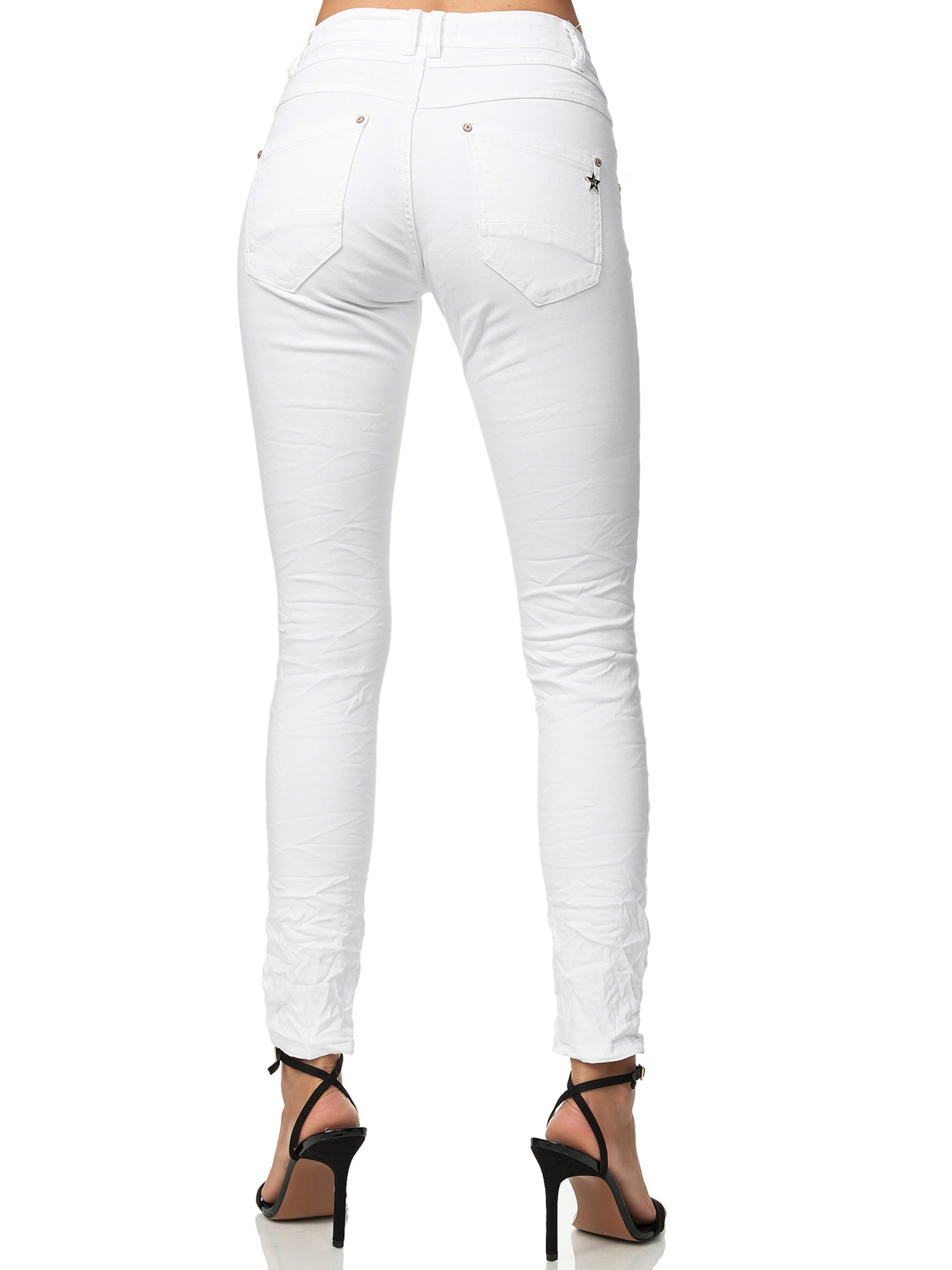 Skinny Jeans di Elara in bianco
