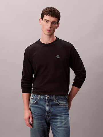 Tricou de la Calvin Klein Jeans pe negru: față