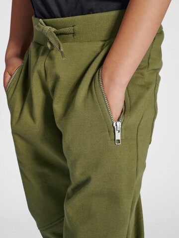 SOMETIME SOON Tapered Trousers in Green