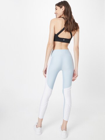 UNDER ARMOUR Skinny Sportovní kalhoty – modrá