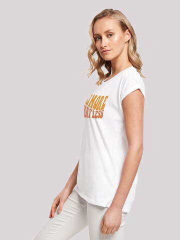 T-shirt 'Ski More Worry Less' F4NT4STIC en blanc