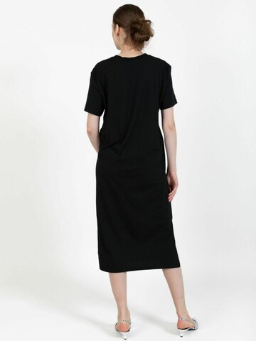 Coster Copenhagen Mekko ' CC ' värissä musta