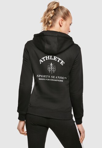 Merchcode Sweatshirt 'Made For Champions' in Zwart: voorkant