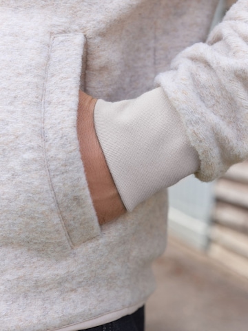 Next Tussenjas in Beige