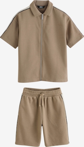 Next Setti värissä ruskea: etupuoli