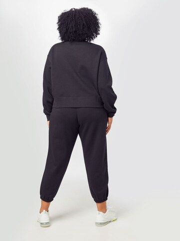 Effilé Pantalon Nike Sportswear en noir